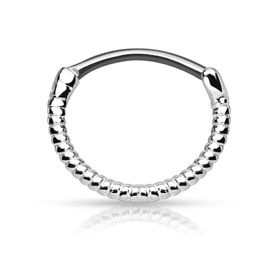 Septum clicker kierretyllä muodolla