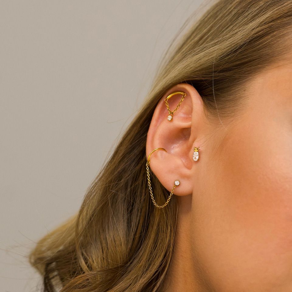Labret – kaari, ketju ja kivi