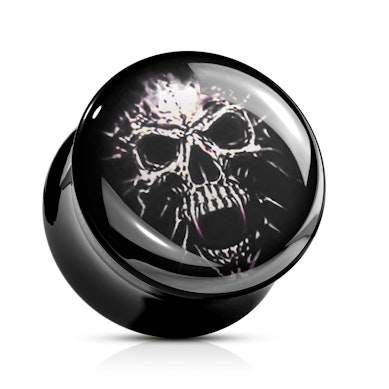 Plugi akryylistä pääkallolla