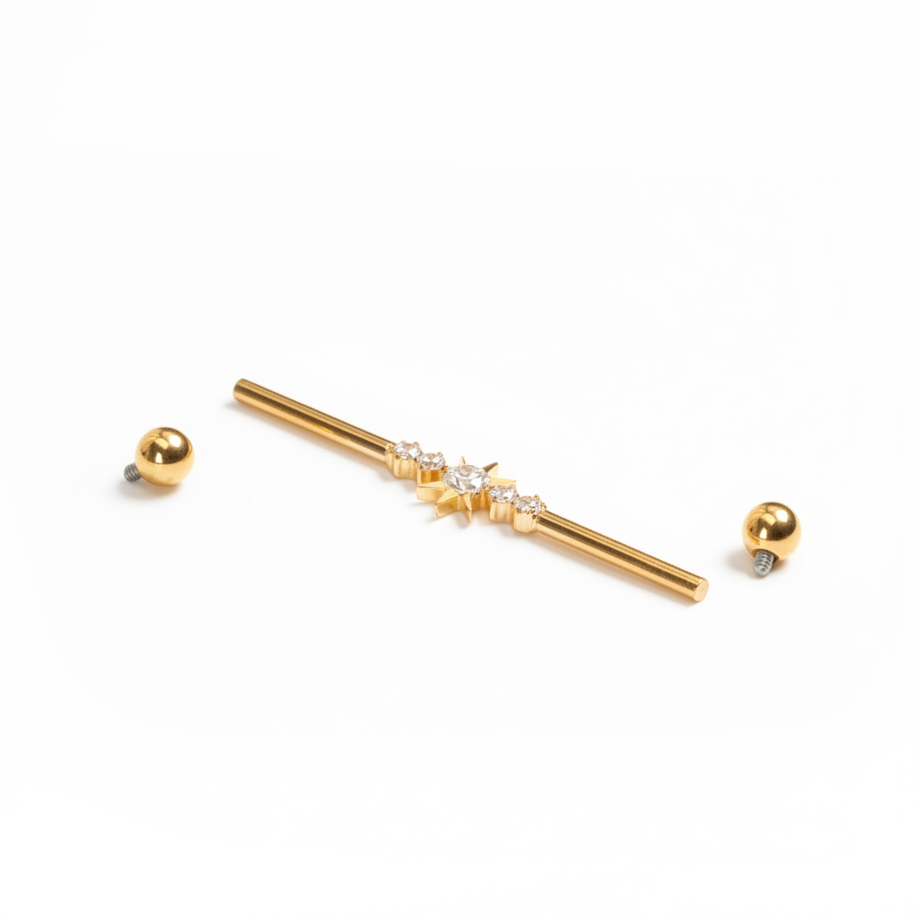 Industrial-titaanibarbelli, jossa tähti ja korukiviä keskellä