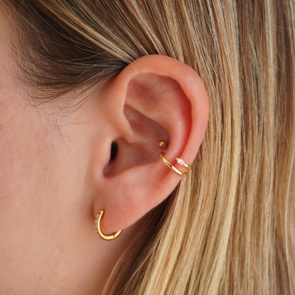 Minimalistinen earcuff korukivellä