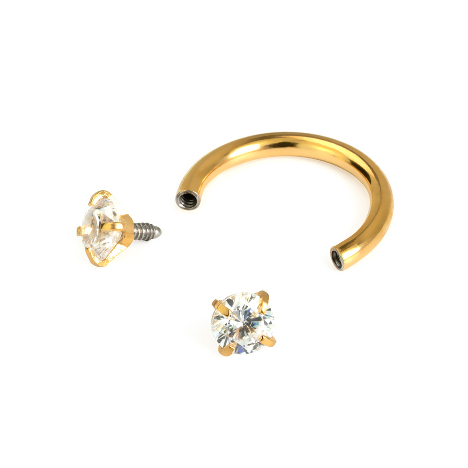 Hevosenkenkä sisäkierteillä ja pyöreillä jalokivillä