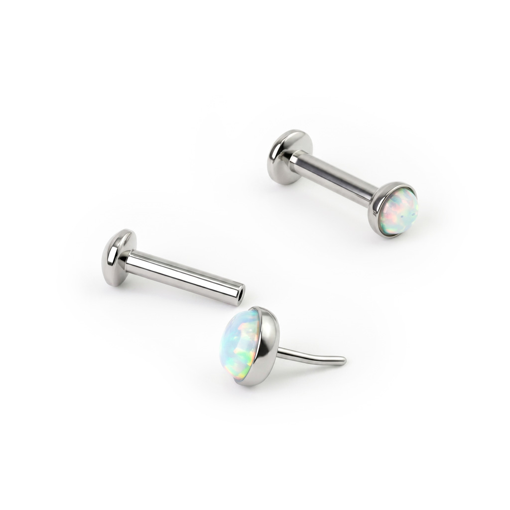 Push-in-labret opaalikivellä