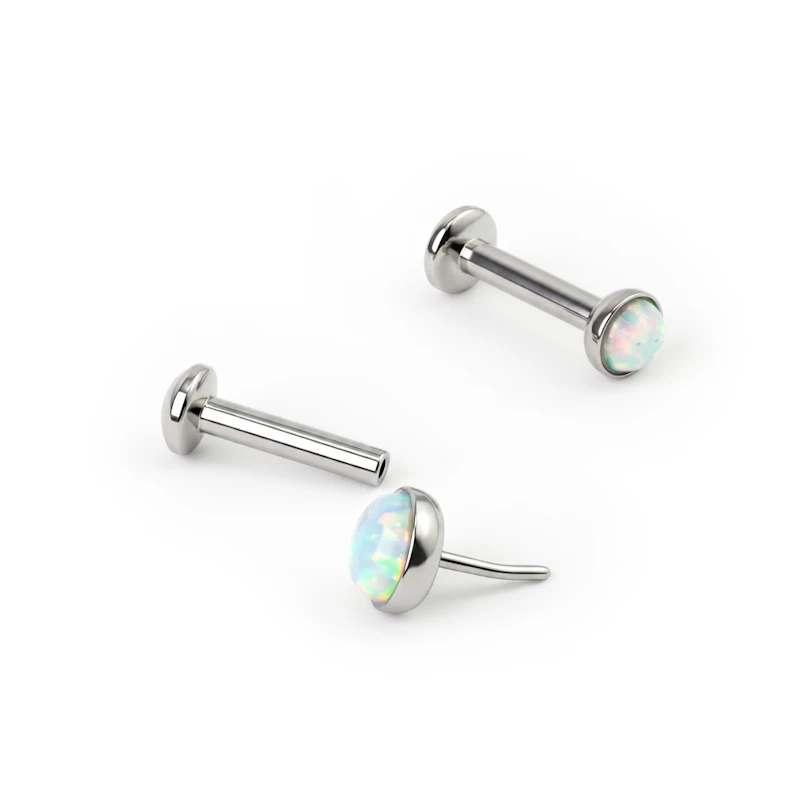 Push-in-labret opaalikivellä