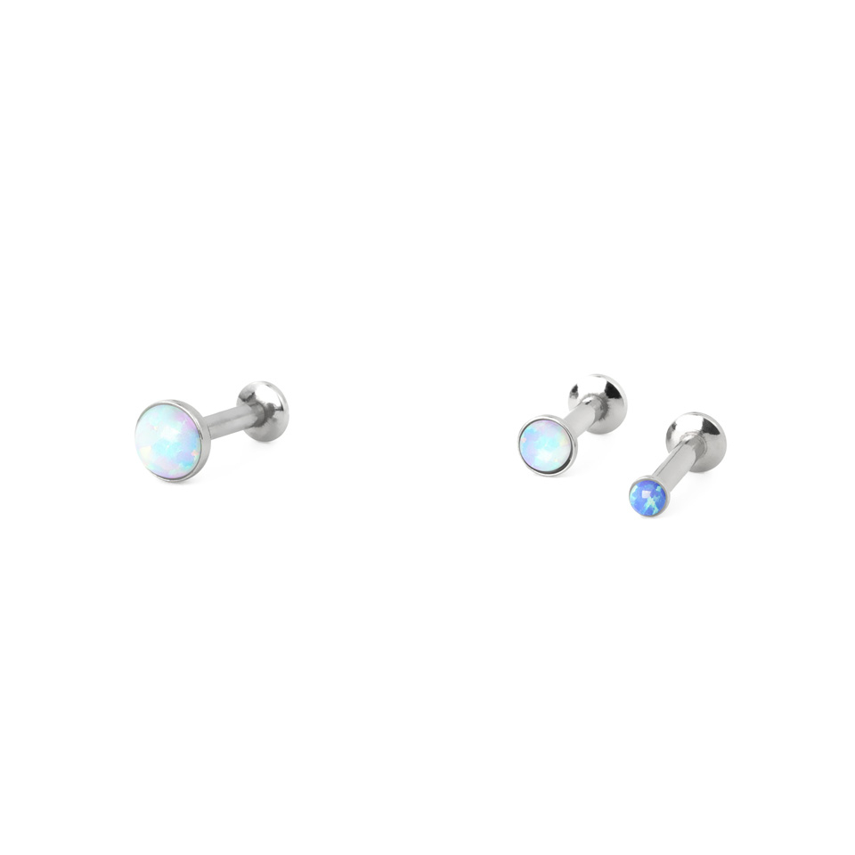Push-in-labret opaalikivellä