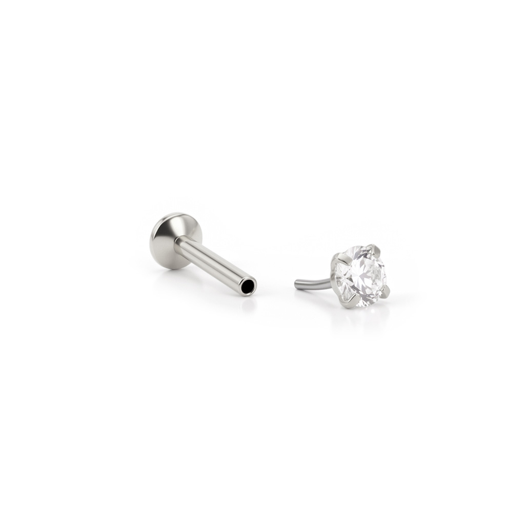 Push-in-labret korukivellä