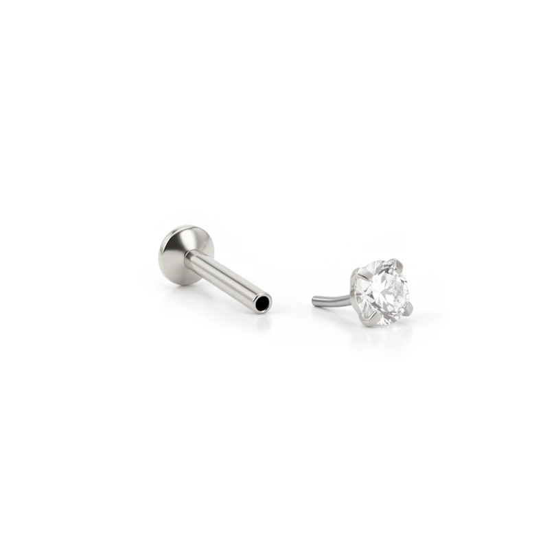 Push-in-labret korukivellä
