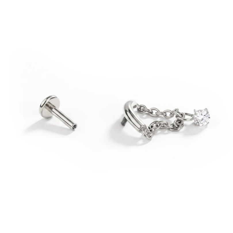 Labret – kaari, ketju ja kivi