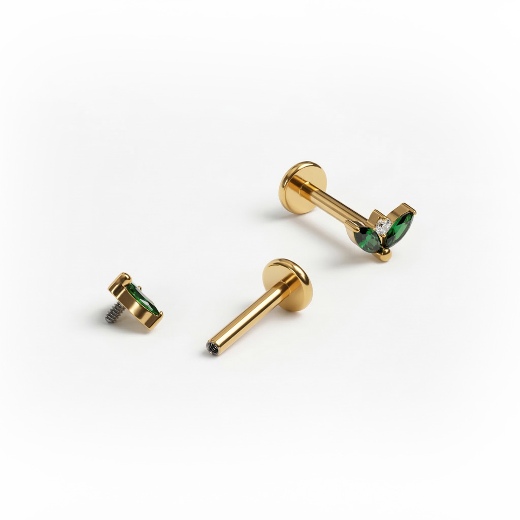 Titaaninen labret smaragdinvärisellä korukiviparilla