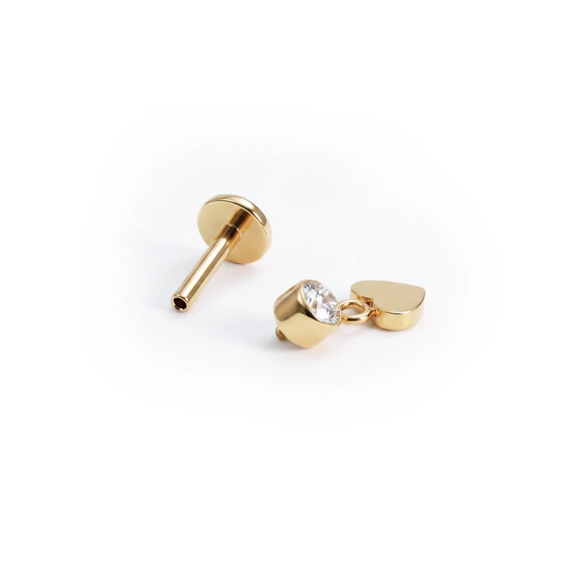 Titaaninen labret sydänriipuksella