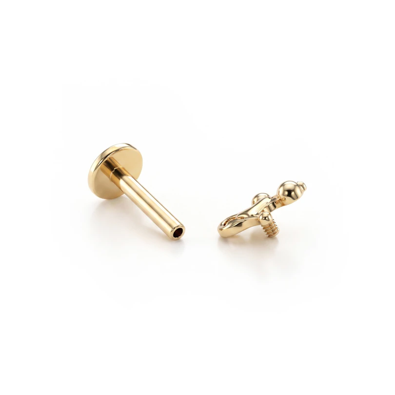 Titaaninen labret ilmapallokoiralla