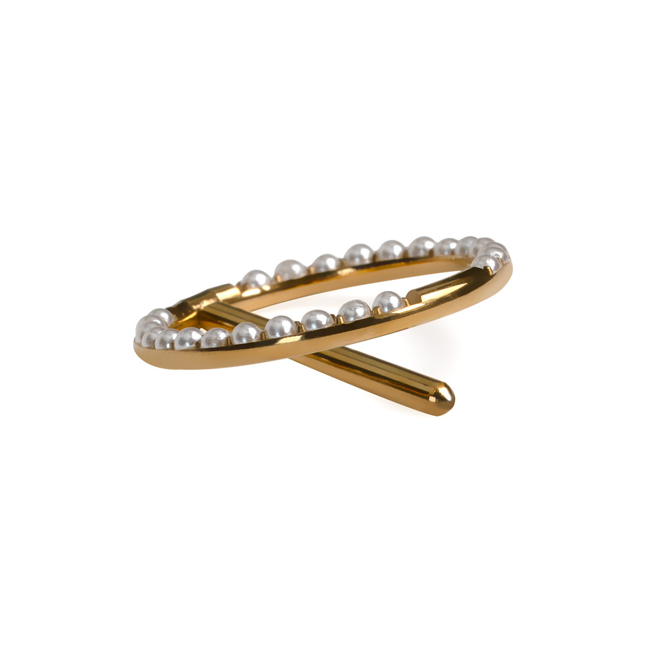 Titaaninen nänni-clicker helmiupotuksin