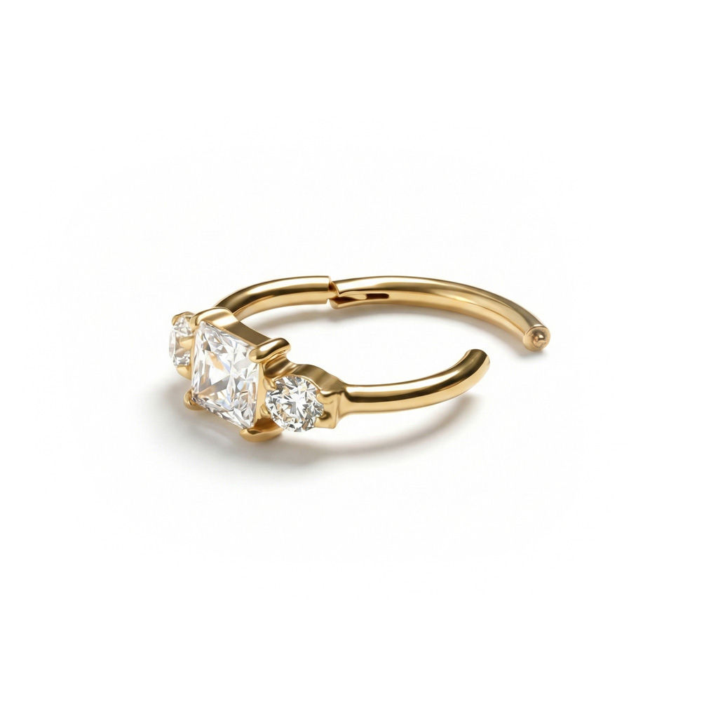 Titaaninen saranallinen rengas kolmella zirkoniakivellä