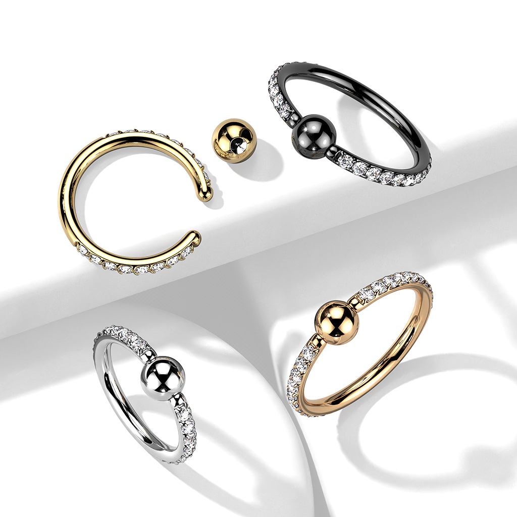 Captive bead -titaanirengas kivireunuksella